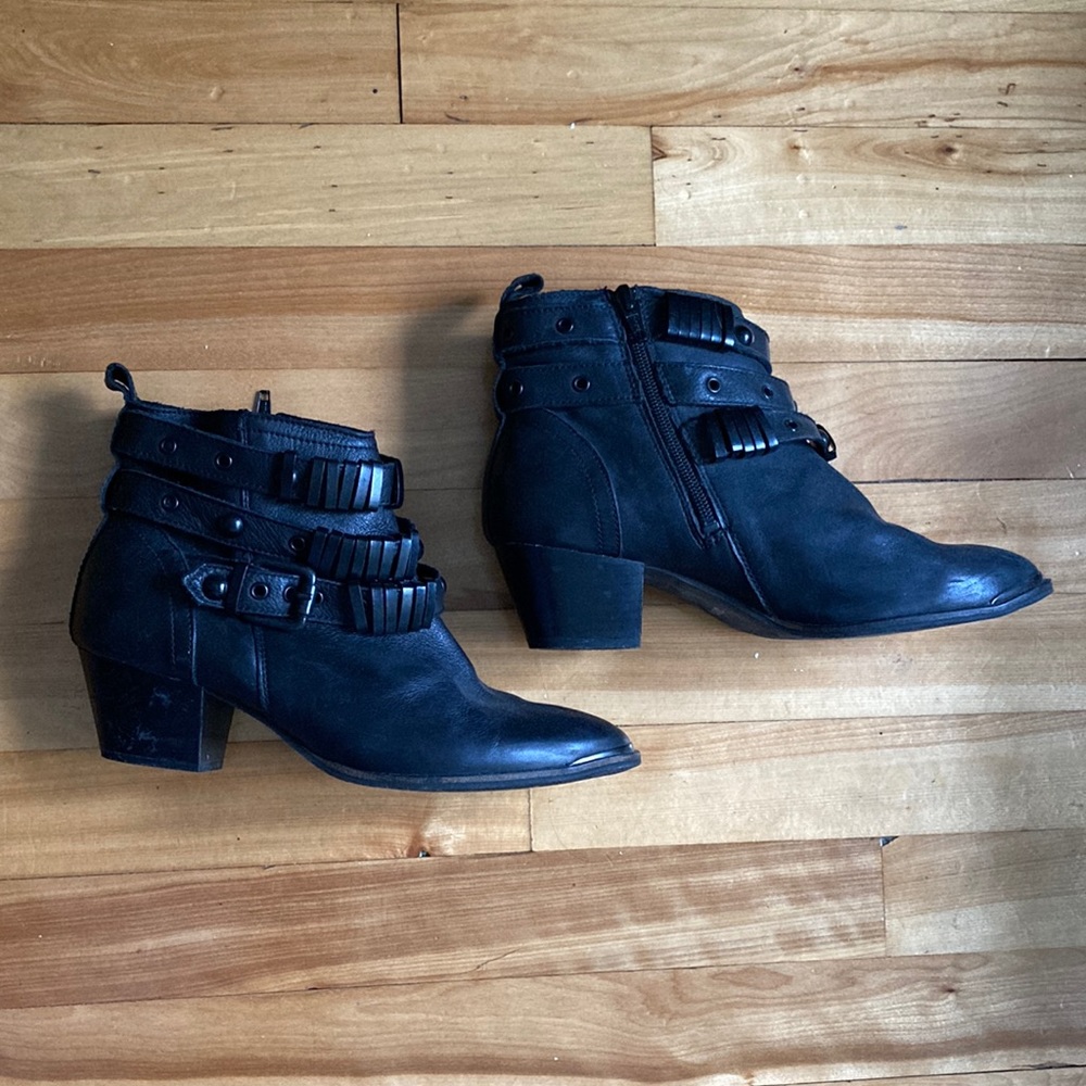 Aldo leather ankle boots, moto style with straps and metal hardware details.